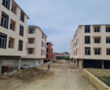 1 otaqlı yeni tikililər Binəqədi r.